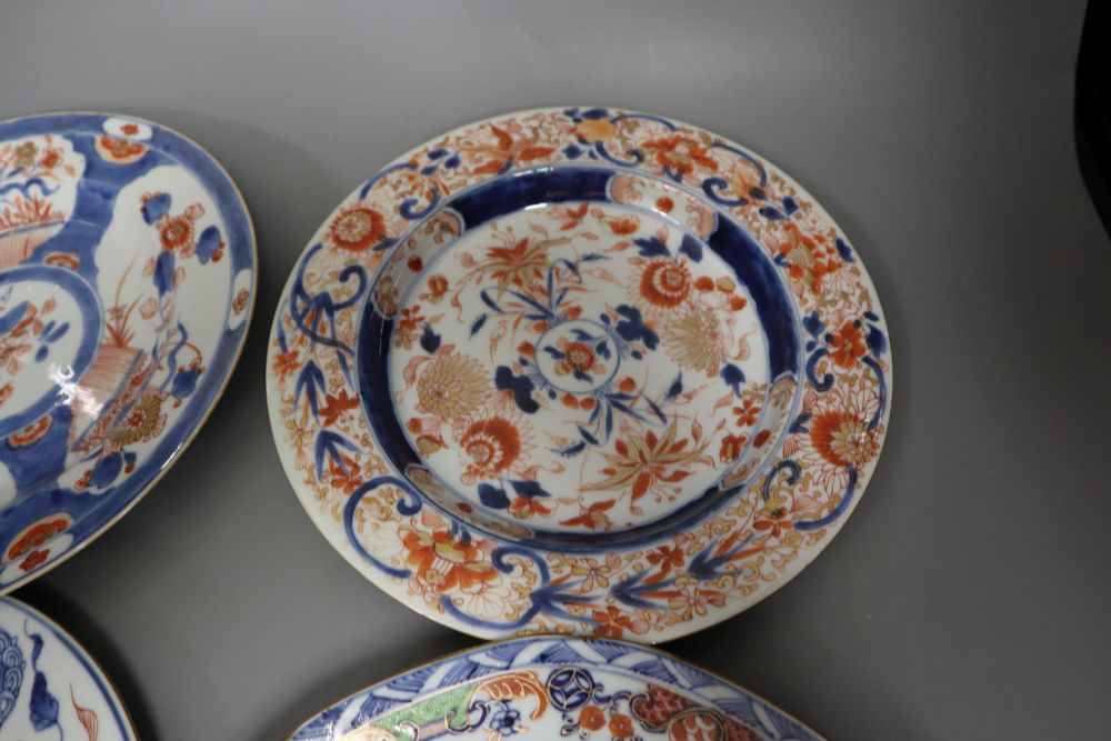 Four 18th century Chinese Imari dishes, 22.5cm, painted underglaze in typical palette